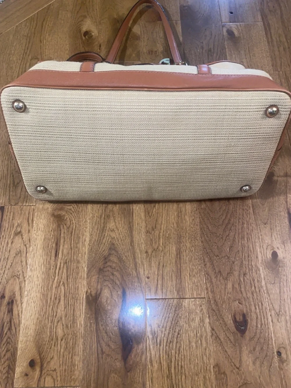Michael Kors Raffia Tote with Tan Leather Trim and handles.